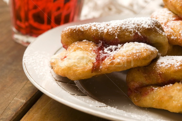Dough with marmelade on wooden board Stock photo © joannawnuk