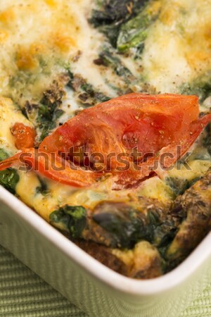 Omelet with vegetables and cheese. Frittata Stock photo © joannawnuk