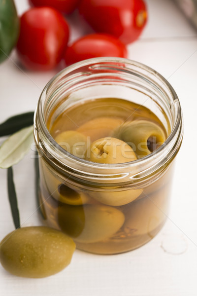 pickled olives and olive tree branch Stock photo © joannawnuk