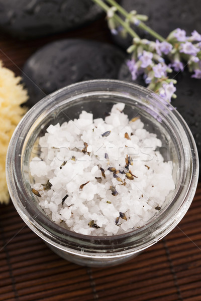 Homemade skin exfoliant (skin scrub) of sea salt, olive oil and  Stock photo © joannawnuk