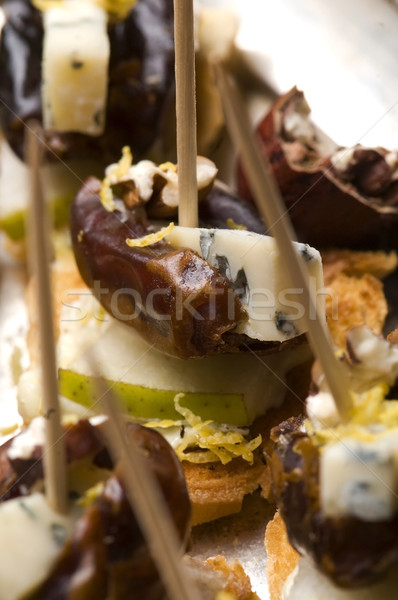 Appetizer Plate with Dactyl, Pecan nuts and Cheese Stock photo © joannawnuk