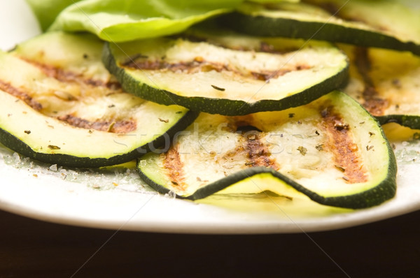 Grilled organic zucchini slices with herbs and spices Stock photo © joannawnuk