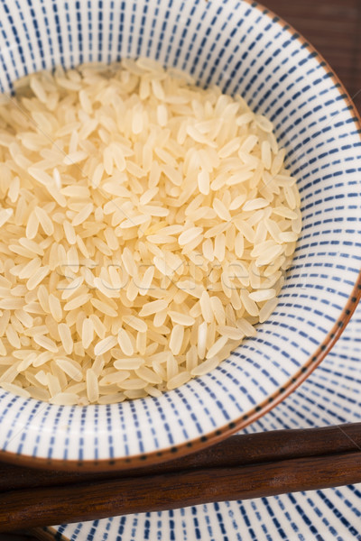 bowl of parboiled risotto rice Stock photo © joannawnuk