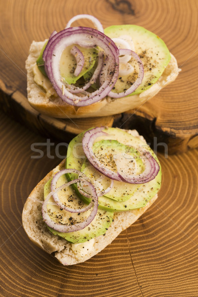 Sandwich with avocado, red onion, salt and herbs Stock photo © joannawnuk
