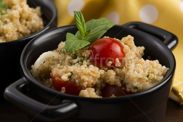 Tabbouleh Quinoa with tomatoes, onion, mint, parsley and lemon Stock photo © joannawnuk