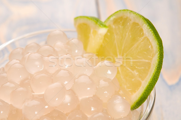 Stock photo: tapioca pearls with lime. white bubble tea ingredients