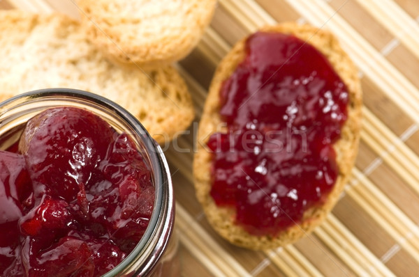 Breakfast of cherry jam on toast
 Stock photo © joannawnuk