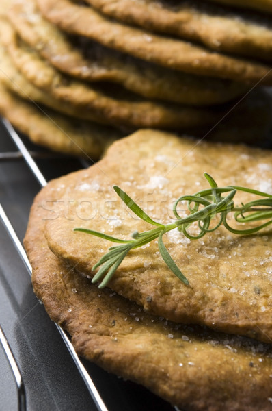 Homemade rustical crackers with rosemary Stock photo © joannawnuk