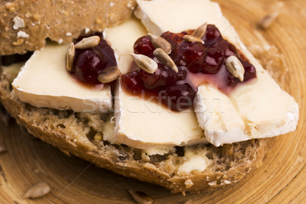 bread served with camembert and cranberry Stock photo © joannawnuk