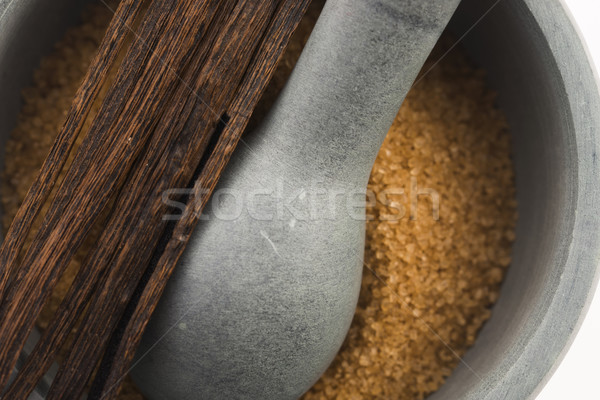 brown vanilla sugar and vanilla beans in mortar Stock photo © joannawnuk