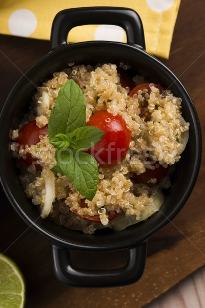 Tabbouleh Quinoa with tomatoes, onion, mint, parsley and lemon Stock photo © joannawnuk