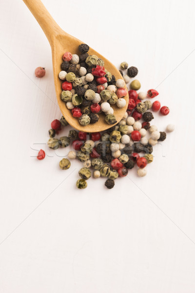 Mixed green, red, white and black peppercorns Stock photo © joannawnuk