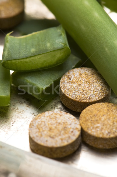 aloe vera plant with pills - herbal medicine Stock photo © joannawnuk