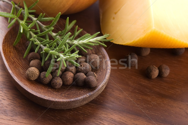 allspice with fresh rosemary, cheese and onion Stock photo © joannawnuk