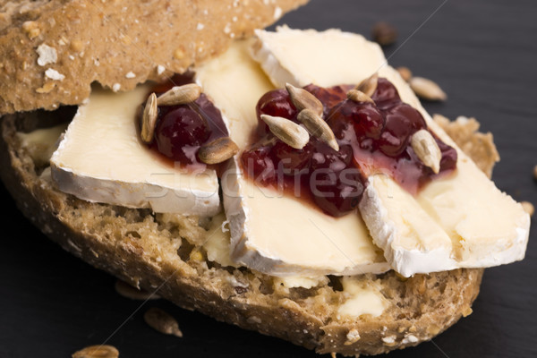 bread served with camembert and cranberry Stock photo © joannawnuk