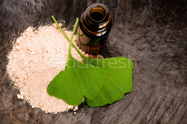 fresh leaves ginko biloba essential oil and powder - beauty trea Stock photo © joannawnuk