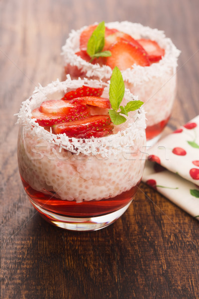 A serving of strawberry over tapioca and jelly Stock photo © joannawnuk