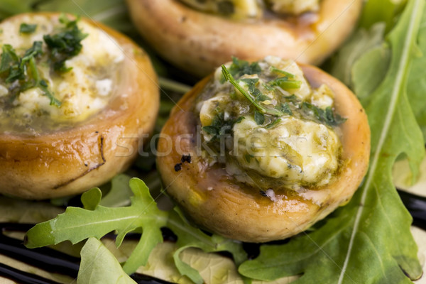 Delicious stuffed mushrooms with cheese and pesto Stock photo © joannawnuk