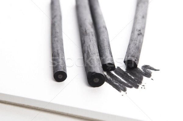 Artist's black charcoal with smudge Stock photo © joannawnuk