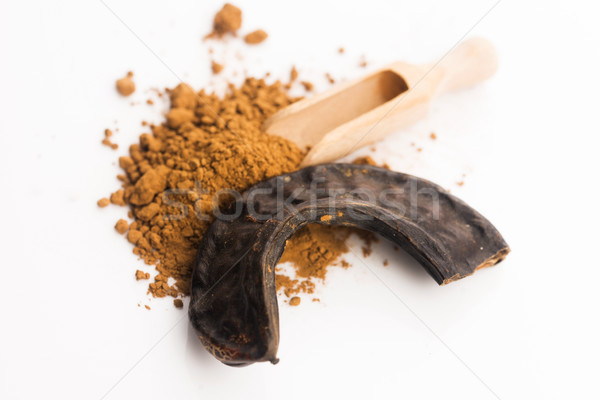 Stock photo: carob pods and carob powder