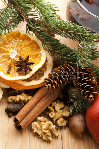 Different kinds of spices, nuts and dried oranges - christmas de Stock photo © joannawnuk