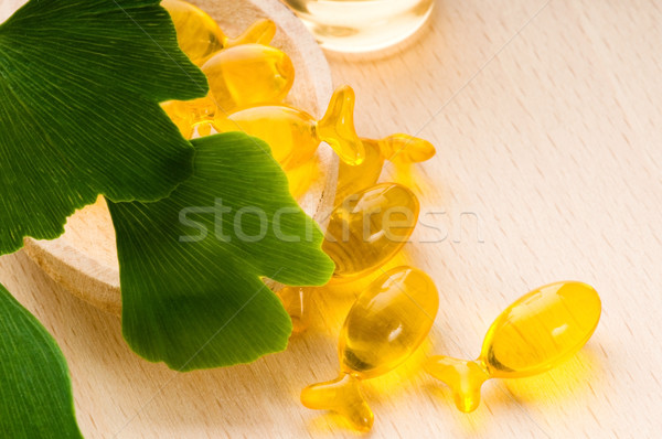 ginko biloba essential oil with fresh leaves - beauty treatment Stock photo © joannawnuk