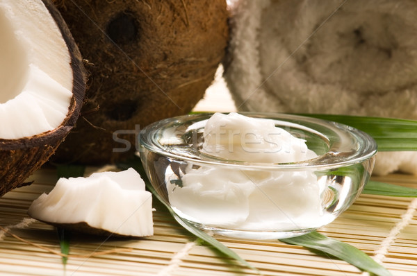 Kokosowe oleju kwiat masażu bambusa równowagi Zdjęcia stock © joannawnuk