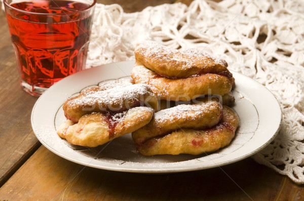 Dough with marmelade on wooden board Stock photo © joannawnuk