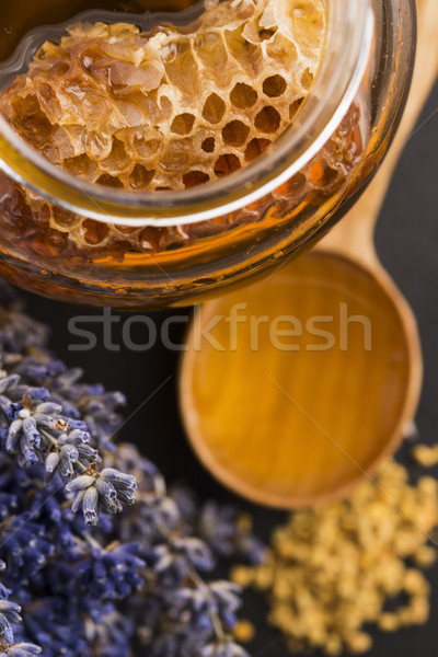Lavender honey with bee pollen and honey comb Stock photo © joannawnuk