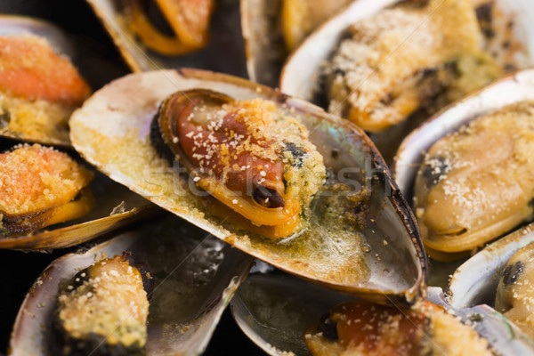 Stock photo: Delicious Fresh Clams with herbs