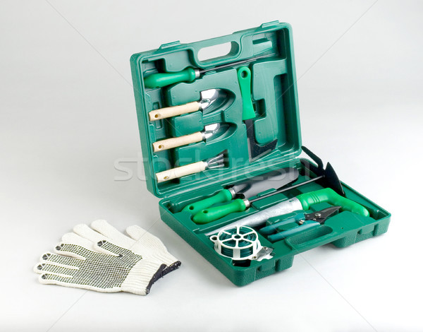 Gardening tools kit in green case Stock photo © JohnKasawa