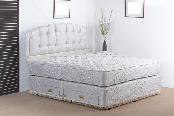 Luxury bedding mattress in a set up bedroom atmosphere  Stock photo © JohnKasawa