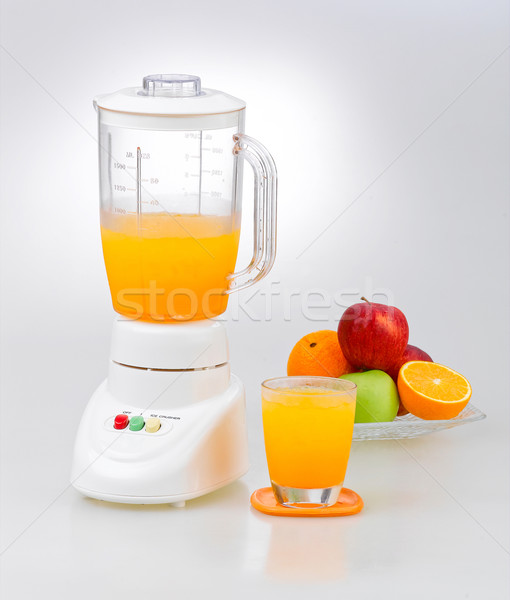 Fruits and orange juice blender Stock photo © JohnKasawa