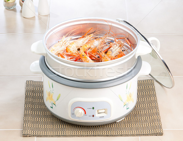 Shrimp seafood in the steaming pot ready to eat Stock photo © JohnKasawa
