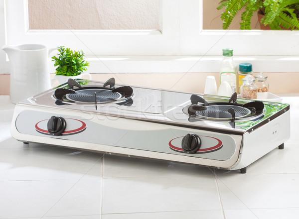 Gas stove with empty gas plate on the kitchen Stock photo © JohnKasawa