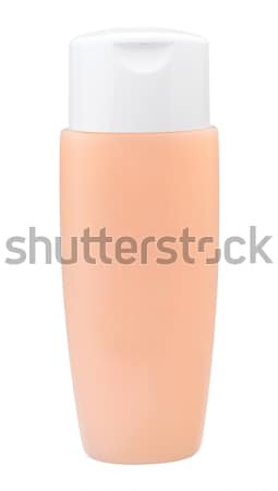 Empty shampoo bottle in light orange color isolates  Stock photo © JohnKasawa