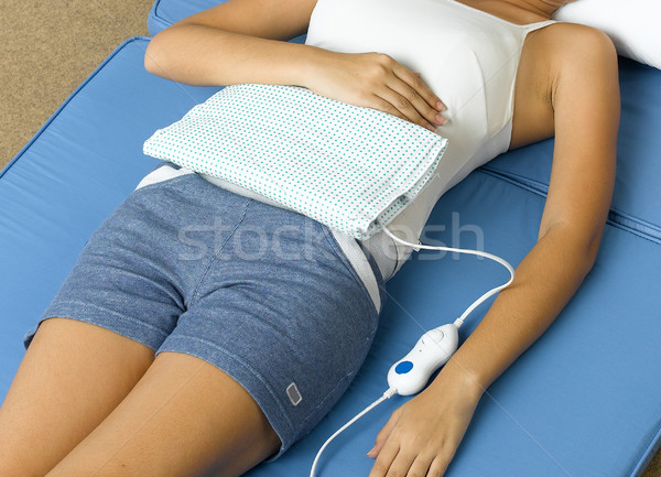 Stock foto: Elektrische · heißen · Packung · Menstruation · Frau · Hand