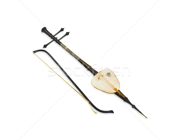 Stock photo: Ivory three stringed fiddle Thai music instrument 