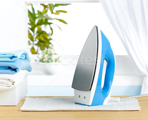 blue iron laundry tool for smart housework Stock photo © JohnKasawa