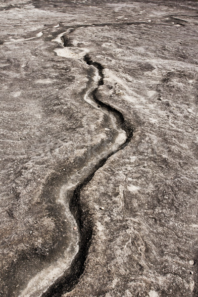 Dried water wake on the rock track  Stock photo © JohnKasawa