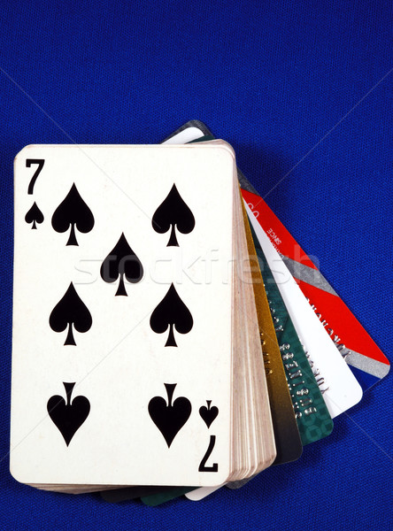 Play cards with credit cards concepts of gambling on credits Stock photo © johnkwan