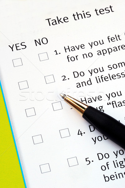 Select Yes or No from a questionnaire with a pen Stock photo © johnkwan