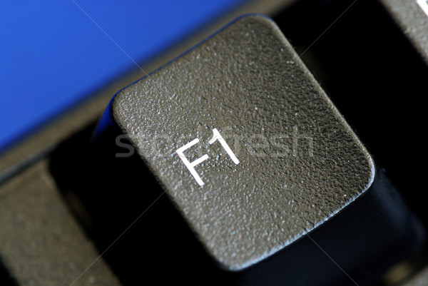 Stock photo: The F1 key represents Help or Assistance isolated on blue