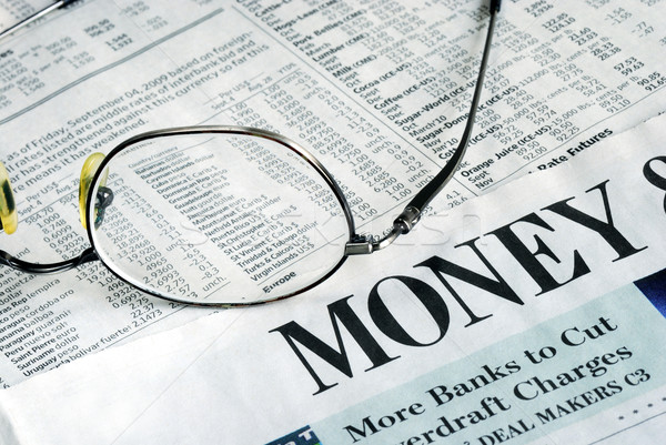 Focus on Money Investing from a newspaper Stock photo © johnkwan