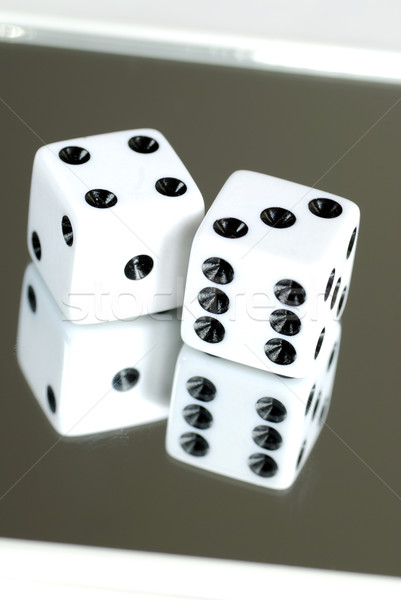 Two dices on the mirror isolated on white Stock photo © johnkwan