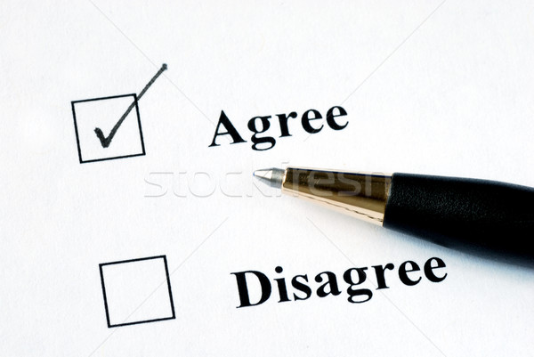 Select the Agree option with a pen Stock photo © johnkwan