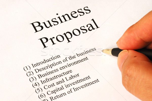 Working on the main topics of a business proposal Stock photo © johnkwan