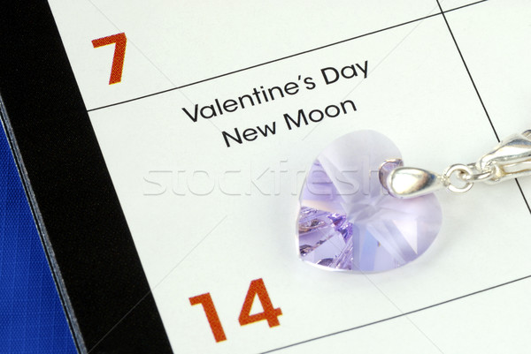 February 14th is the Valentine’s Day isolated on blue Stock photo © johnkwan