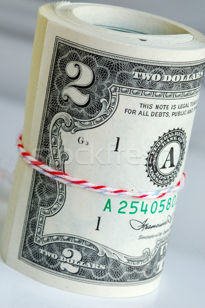 A strap of United States $2 bills Stock photo © johnkwan