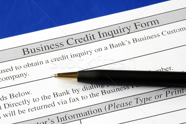 Complete the credit inquiry form isolated on blue Stock photo © johnkwan